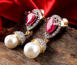 Vogue Crafts & Designs Pvt. Ltd. manufactures and exports imitation jewelry earrings at wholesale prices