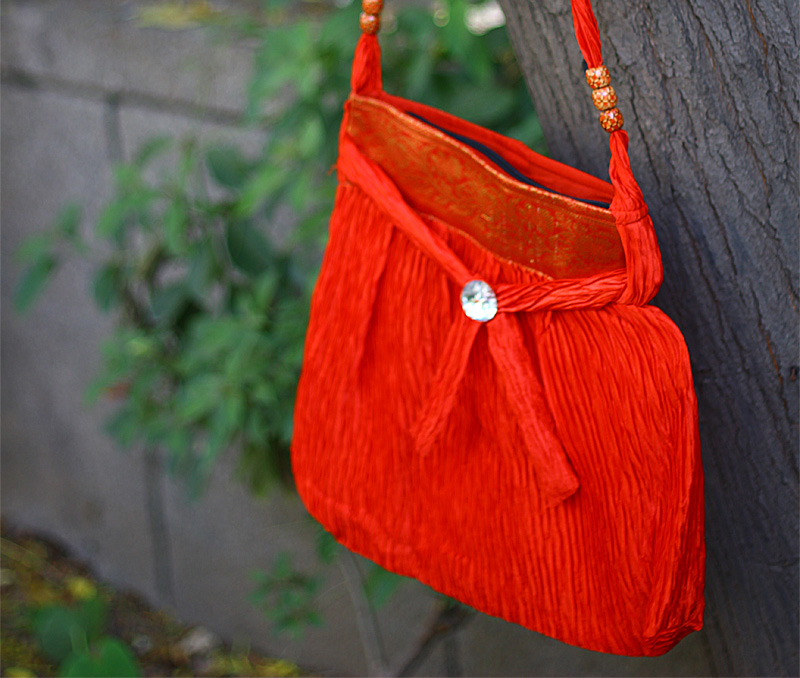 Vogue Crafts & Designs Pvt. Ltd. manufactures Satin and Zari Work Bag at wholesale price.