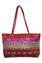 Vogue Crafts and Designs Pvt. Ltd. manufactures Maroon Floral Embroidery Bag at wholesale price.