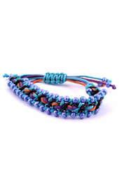 Vogue Crafts and Designs Pvt. Ltd. manufactures Blue Beads and Chain Bracelet at wholesale price.