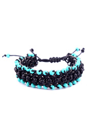 Vogue Crafts and Designs Pvt. Ltd. manufactures Surrounded by Teal Bracelet at wholesale price.