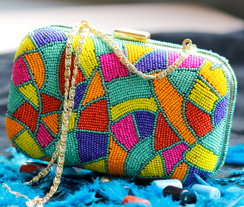 Vogue Crafts & Designs Pvt. Ltd. manufactures Colors and Beads Clutch at wholesale price.