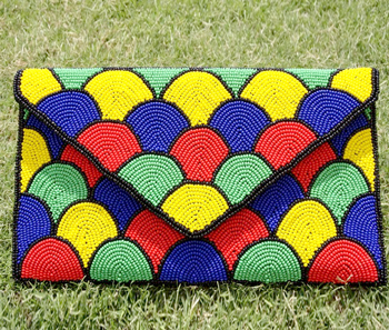 Vogue Crafts & Designs Pvt. Ltd. manufactures The Colored Eggs Clutch at wholesale price.