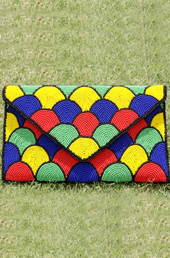 Vogue Crafts and Designs Pvt. Ltd. manufactures The Colored Eggs Clutch at wholesale price.