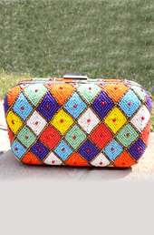 Vogue Crafts and Designs Pvt. Ltd. manufactures Kite Pattern Clutch at wholesale price.