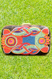 Vogue Crafts and Designs Pvt. Ltd. manufactures Splash of Colors Clutch at wholesale price.