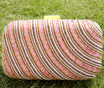 Vogue Crafts & Designs Pvt. Ltd. manufactures The Beady Horizon Clutch at wholesale price.