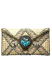 Vogue Crafts and Designs Pvt. Ltd. manufactures The Cream Partywear Clutch at wholesale price.