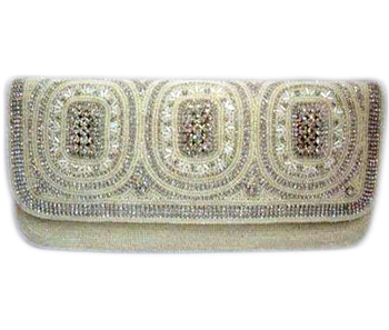 Vogue Crafts & Designs Pvt. Ltd. manufactures The White Glory Clutch at wholesale price.