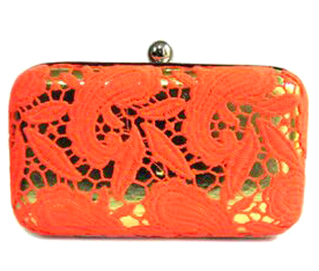 Vogue Crafts & Designs Pvt. Ltd. manufactures The Orange Funk Clutch at wholesale price.