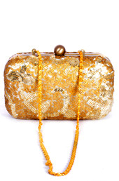 Vogue Crafts and Designs Pvt. Ltd. manufactures Sequined Flowers Clutch at wholesale price.