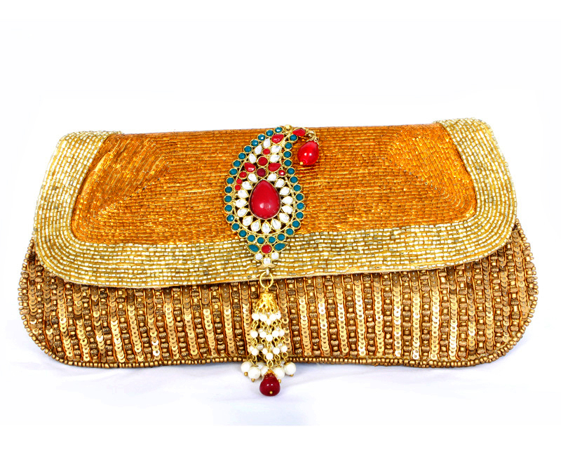 Vogue Crafts & Designs Pvt. Ltd. manufactures Gold Beaded Evening Clutch at wholesale price.