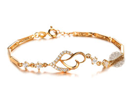 Vogue Crafts and Designs Pvt. Ltd. manufactures Diamond and Gold Heart Bracelet at wholesale price.