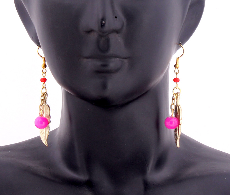 Vogue Crafts & Designs Pvt. Ltd. manufactures The Feather Charm Earrings at wholesale price.