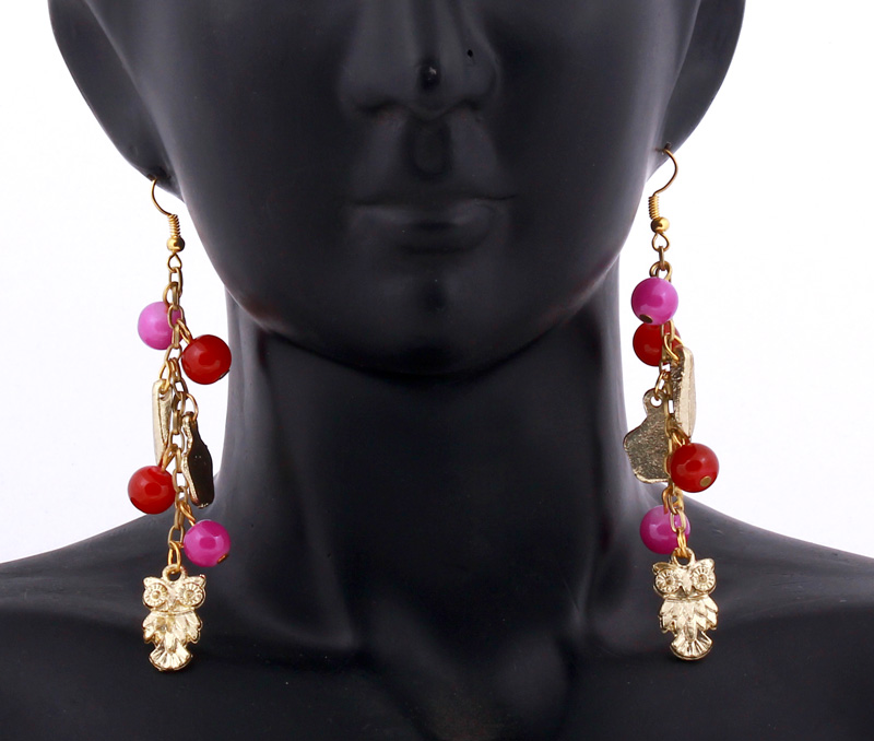 Vogue Crafts & Designs Pvt. Ltd. manufactures Pink and Maroon Earrings at wholesale price.