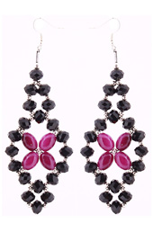 Vogue Crafts and Designs Pvt. Ltd. manufactures Trapped Purple Flower Earrings at wholesale price.