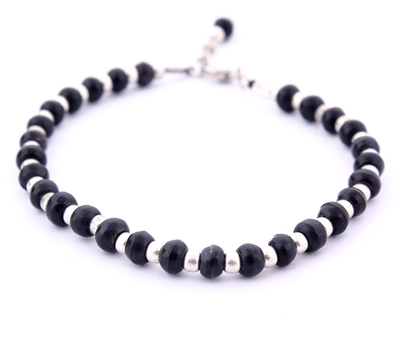 Vogue Crafts & Designs Pvt. Ltd. manufactures Black and Silver Beads Anklet at wholesale price.
