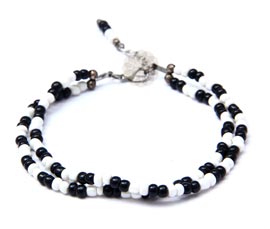 Vogue Crafts and Designs Pvt. Ltd. manufactures Black and White Bead Anklet at wholesale price.