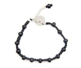 Vogue Crafts and Designs Pvt. Ltd. manufactures Braided Black Bead Anklet at wholesale price.