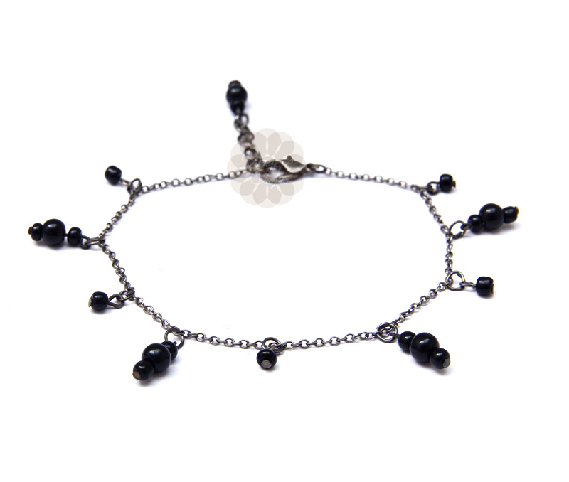Vogue Crafts & Designs Pvt. Ltd. manufactures Dangling Black Bead Anklet at wholesale price.