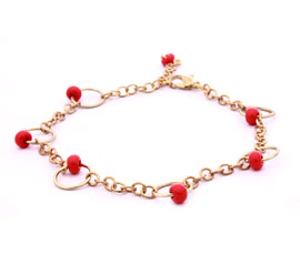 Vogue Crafts and Designs Pvt. Ltd. manufactures Fancy Golden and Red Anklet at wholesale price.