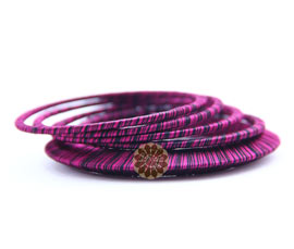 Vogue Crafts and Designs Pvt. Ltd. manufactures Stack of Purple Bangles at wholesale price.
