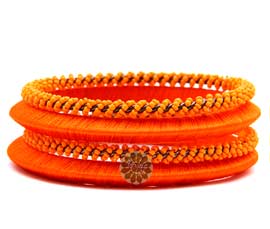 Vogue Crafts and Designs Pvt. Ltd. manufactures Beaded Orange Bangle Stack at wholesale price.