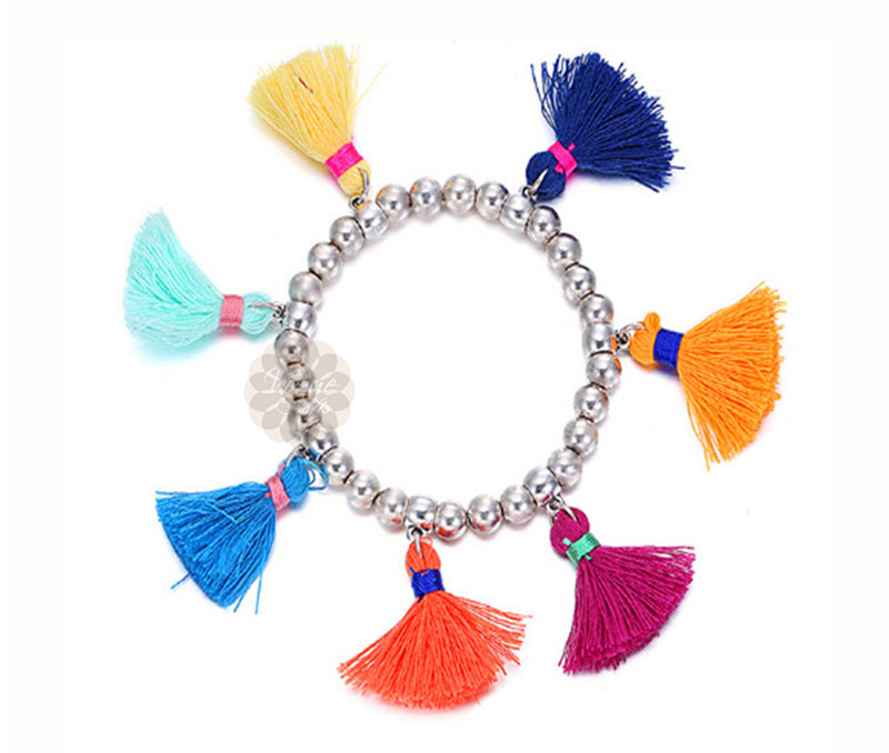 Vogue Crafts & Designs Pvt. Ltd. manufactures Multicolor Tassels Bracelet at wholesale price.
