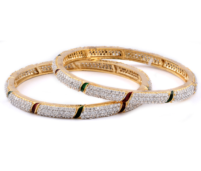 Vogue Crafts & Designs Pvt. Ltd. manufactures Golden Brass Bangles With Meenakari at wholesale price.