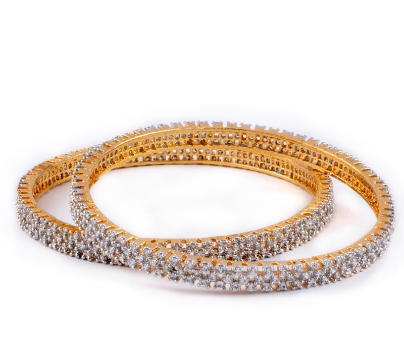 Vogue Crafts & Designs Pvt. Ltd. manufactures Chequered Golden Brass Bangles at wholesale price.