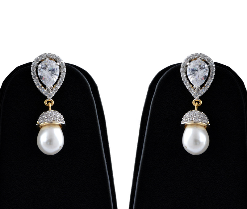 Vogue Crafts & Designs Pvt. Ltd. manufactures Pearl Drop American Diamond Earrings at wholesale price.
