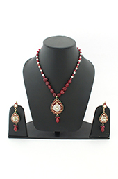 Vogue Crafts and Designs Pvt. Ltd. manufactures Kundan-Meena work Necklace Earrings set at wholesale price.