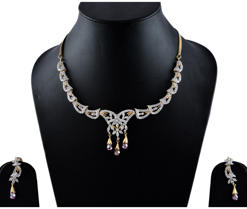 Vogue Crafts & Designs Pvt. Ltd. manufactures American Diamonds with Rubi Earrings-Necklace set at wholesale price.