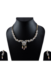 Vogue Crafts and Designs Pvt. Ltd. manufactures American Diamonds with Rubi Earrings-Necklace set at wholesale price.