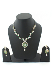 Vogue Crafts and Designs Pvt. Ltd. manufactures Emerald and Diamonds Earrings-Necklace set at wholesale price.