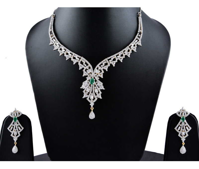 Vogue Crafts & Designs Pvt. Ltd. manufactures Green Emerald Earrings Necklace set at wholesale price.