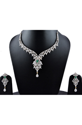Vogue Crafts and Designs Pvt. Ltd. manufactures Green Emerald Earrings Necklace set at wholesale price.