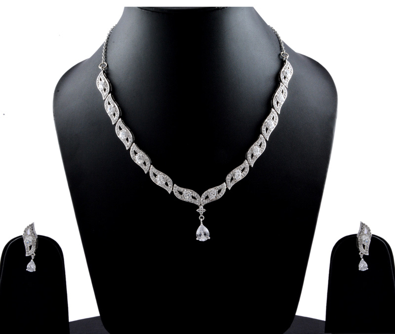 Vogue Crafts & Designs Pvt. Ltd. manufactures The Indian Diva Earrings-Necklace set at wholesale price.