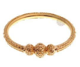 Vogue Crafts and Designs Pvt. Ltd. manufactures Exquisite Traditional Golden Bangle at wholesale price.