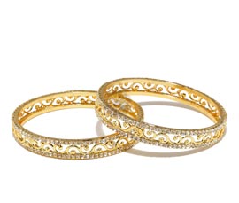 Vogue Crafts and Designs Pvt. Ltd. manufactures Eternal Treasure Pair of Bangles at wholesale price.