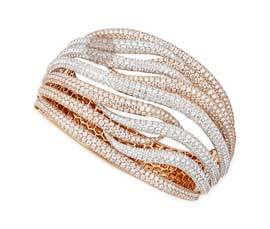 Vogue Crafts and Designs Pvt. Ltd. manufactures Bright Light Golden Cuff at wholesale price.