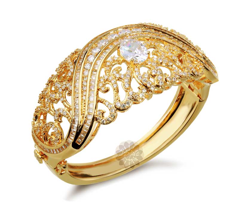 Vogue Crafts & Designs Pvt. Ltd. manufactures Galaxy of Stones Golden Handcuff at wholesale price.