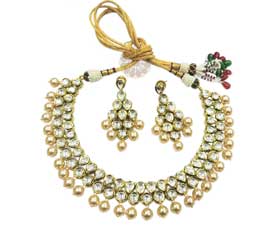 Vogue Crafts and Designs Pvt. Ltd. manufactures Dazzling Pearl Gold Plated Necklace at wholesale price.