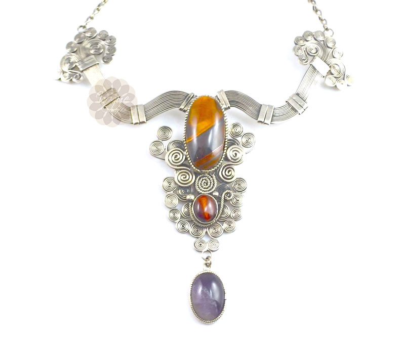 Vogue Crafts & Designs Pvt. Ltd. manufactures Gold Plated Resin Stone Necklace at wholesale price.