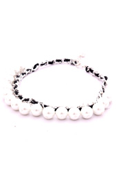 Vogue Crafts and Designs Pvt. Ltd. manufactures Weave and Pearls Necklace at wholesale price.