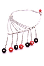 Vogue Crafts and Designs Pvt. Ltd. manufactures Drops of Red and Black Necklace at wholesale price.