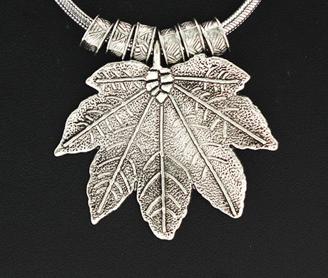 Vogue Crafts & Designs Pvt. Ltd. manufactures Maple Leaf Silver Pendant at wholesale price.