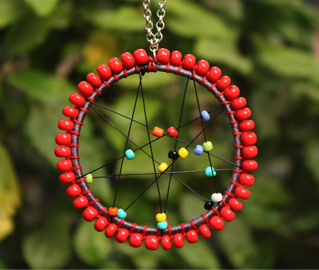 Vogue Crafts & Designs Pvt. Ltd. manufactures The Circle of Red Pendant at wholesale price.