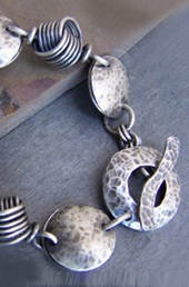 Vogue Crafts and Designs Pvt. Ltd. manufactures Knot Silver Bracelet at wholesale price.