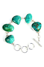 Vogue Crafts and Designs Pvt. Ltd. manufactures Turquoise Stone Silver Bracelet at wholesale price.